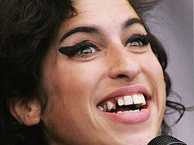 Amy Winehouse hospitalized after fainting in London home